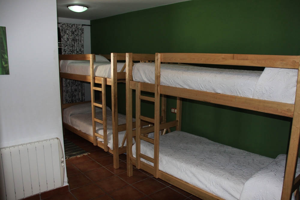 Dormitorio literas con baño